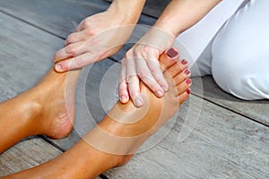 Reflexology woman feet massage therapy
