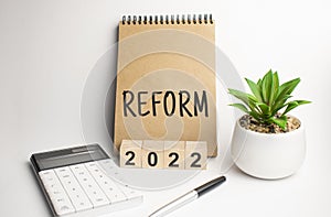 reform 2022 on paper notepad on office work place