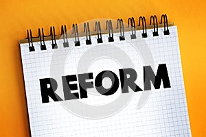 Reform - improvement or amendment of what is wrong, corrupt, unsatisfactory, text concept on notepad