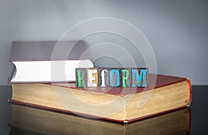 Reform word from colored wooden letters