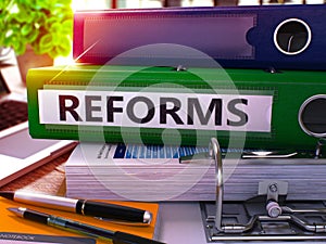 Reforms on Green Office Folder. Toned Image. 3D.