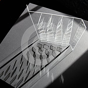 Producing grafic elements - Fascinating play of light and shadow - Acrylic glass object with it`s refracting light photo