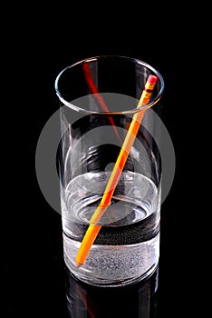 Refraction of Yellow Pencil in Glass of Water