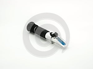 Refractometer on white background