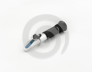 Refractometer on white background