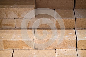 Refractory bricks. It is used for laying stoves and fireplaces in places of direct contact with open fire.