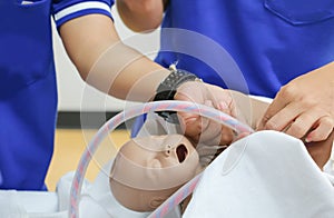 Refresher training to assist childbirth newborn with medical baby dummy