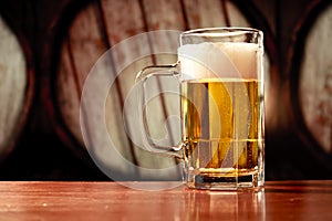 Refreshing beer mug on vintage background