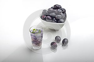 Refreshing Black Plum Mojito: Muddled Delight with Lemon and Mint