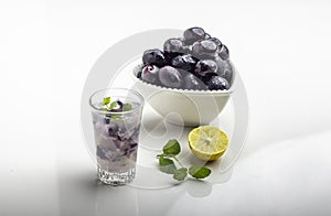 Refreshing Black Plum Mojito: Muddled Delight with Lemon and Mint