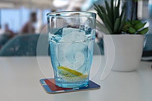 Refreshing glass of water with ice and lemon San Jaun, Tenerife, Spain photo