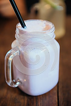 Refreshing blueberry milkshake in a glass