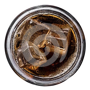 Refreshing cola with ice cubes in a glass, top view,