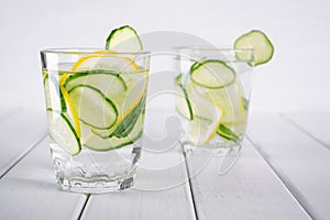 Refreshing cucumber cocktail, lemonade, detox water in a glasses. Summer drink.