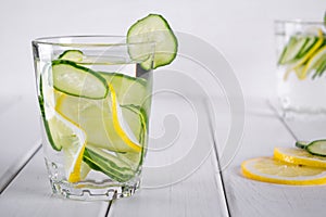 Refreshing cucumber cocktail, lemonade, detox water in a glasses . Summer drink.