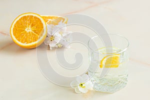 A refreshing fruit juice with mint sliced lemon and orange