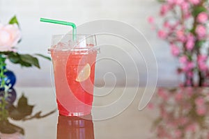 Refreshing fruit punch beverage in glass. Mixed cocktails, party punch  and frozen summer drinks.