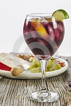 Refreshing ice cold fruit filled red sangria with appetizers