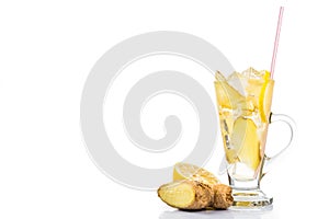 Refreshing ice cold ginger lemon tea in transparent glass