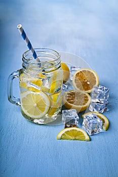 Refreshing ice cold water with lemon