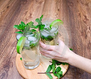 Refreshing ice drink with lime and mint