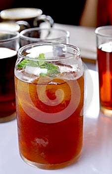 Refreshing ice tea with mint leaf