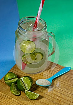 Refreshing light mineral lemonade with ice and sugar photo