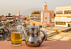 Refreshing with mint tea at the roof near Jemaa el-Fnaa square i photo
