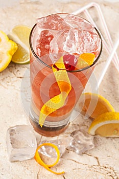 Refreshing red drink with grapefruit and lemon