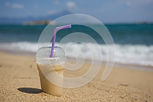 Refreshing smoothie on the Mediterranean beach. Concept vacation. Copy space