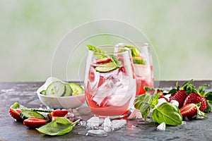 Refreshing spring or summer cocktails with strawberry and cucumber