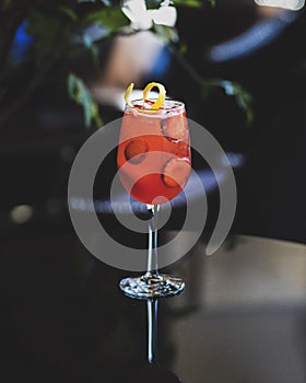 Strawberry Fizz Cocktail - Bright cocktail with dark and moody backdrop