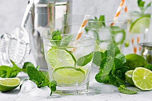 Refreshing summer alcoholic cocktail mojito with ice, fresh mint and lime