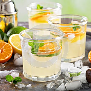 Refreshing summer cocktail with citrus fruits