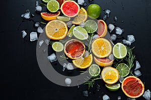 Refreshing summer  cocktail  with crushed  and citrus fruits on the dark background