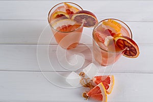 Refreshing summer cocktails with citrus fruits
