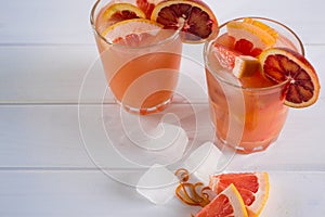 Refreshing summer cocktails with citrus fruits