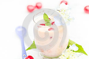 Refreshing summer drink fruit cocktail cherries