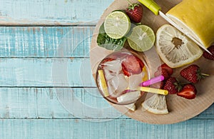 Refreshing summer drink with fruit and ice