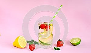 Refreshing summer drinks from lemon, lime, strawberry, orange, mint on a pink background. Detox, healthy eating, diets, fitness