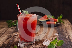 Refreshing summer watermelon juice in glasses with slices of watermelon