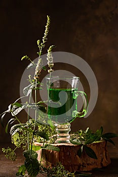 Refreshing tarragon drink and blooming fresh mint