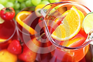 Refreshment beverage in pitcher with fruits
