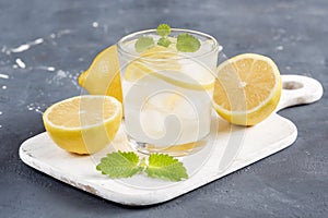 Refreshment Summer drink. Traditional lemonade with lemon mint and ice