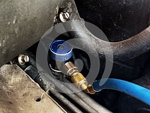 Refrigerant Manifold Gauge Air Conditioning Tools in the car. liquid air pressure
