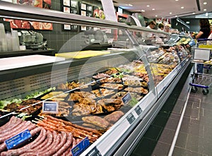 Refrigerated counter in supermarket