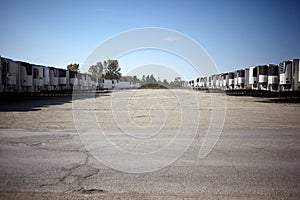 Refrigerated semi trailers at a transport depot