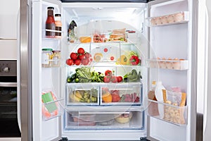Refrigerator With Fruits And Vegetables photo