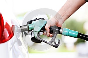 Refuel car with petrol photo