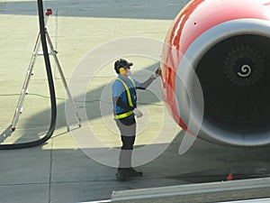 Refuel truck for airplane parked and waiting refuel and checking the airplane on ground in the airport.